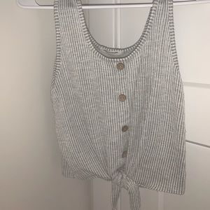 Cropped grey striped tank with tie on the bottom